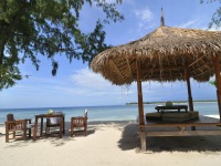 Relax on one of Bali's white-sand beaches